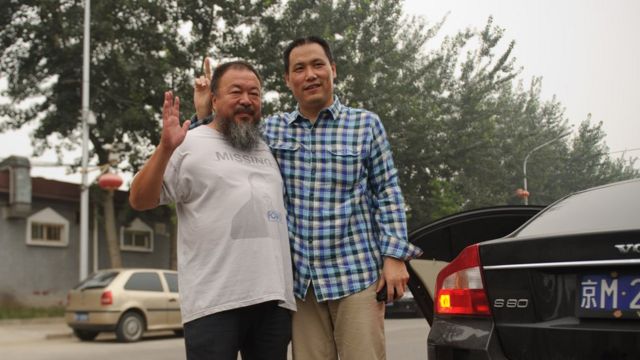 中国异议人士艾未未（左）与维权律师浦志强（右）