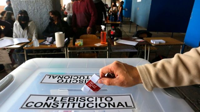 A man votes during a constitutional referendum in Chile.