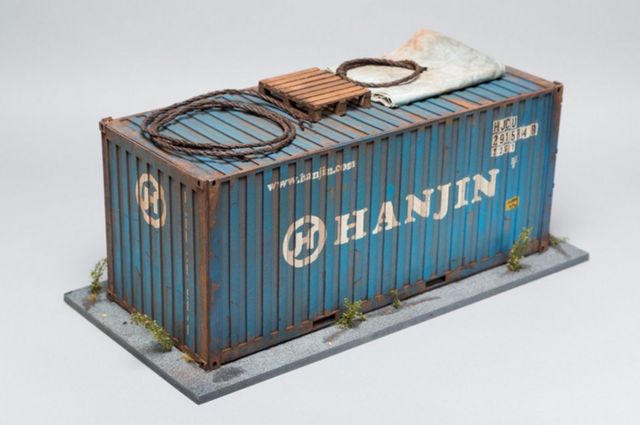 A small model of a shipping container