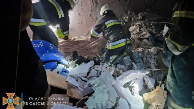 Rescuers comb through the rubble in Serhiyivka, Odesa region, on 1 July 2022