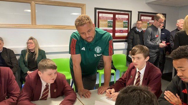 Wes Brown with students