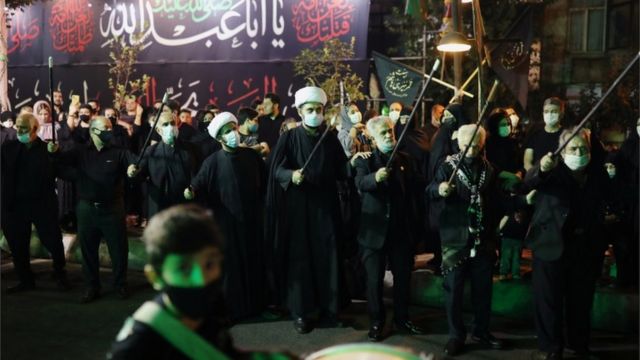 Iraníes en una celebración religiosa