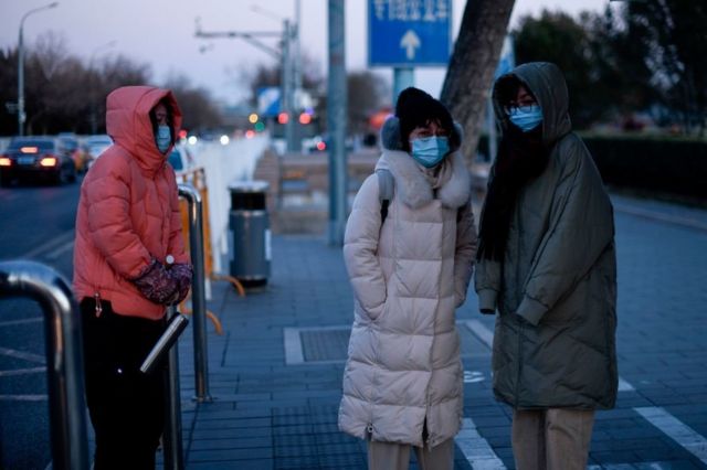 Pedestrians have put on thick jackets.