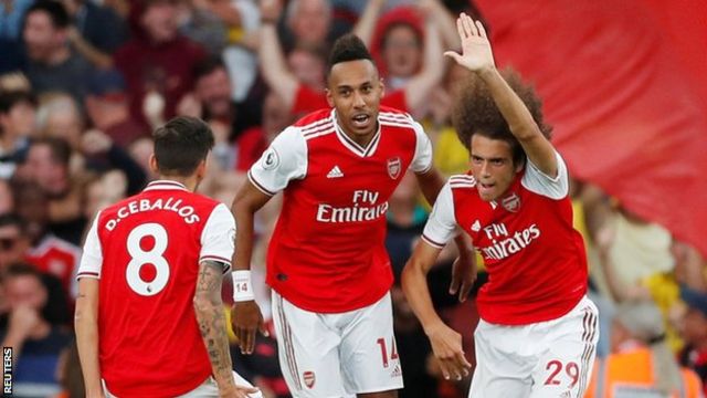 Matteo Guendouzi celebrates with his Arsenal team-mates