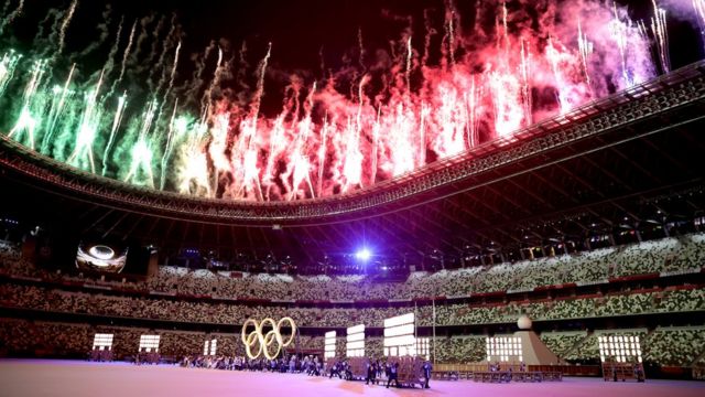 A general view inside the stadium as fireworks go off and performers dance during the Opening Ceremony of the Tokyo 2020 Olympic Games at Olympic Stadium on July 23, 2021 in Tokyo, Japan.