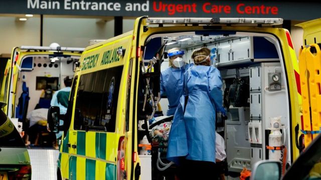 A patient is treated in an ambulance at Guy's Hospital in central London on Tuesday.