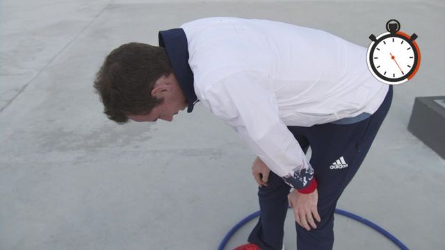 Andy Murray looks in disbelief at the hula hoop around his ankles