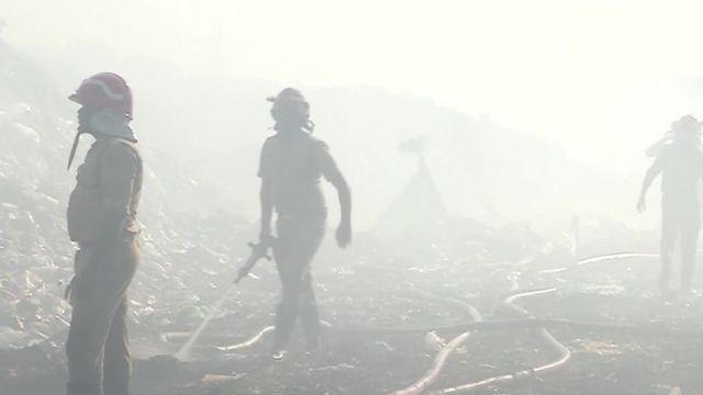 A photo of firefighters at the scene during the 2021 fire