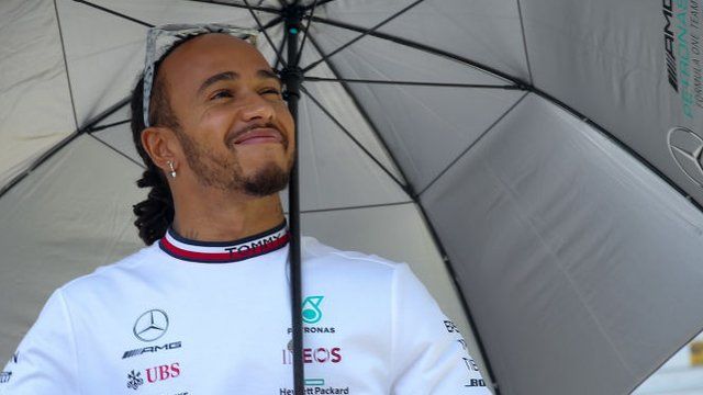 Hamilton was all smiles before the race, after he went from 20 to fifth in the sprint race
