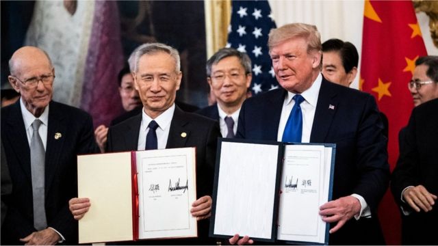 President Donald J. Trump signs a trade agreement with Chinese Vice Premier of the People's Republic of China, Liu He in the East Room at the White House on Wednesday, Jan 15, 2020 in Washington, DC.