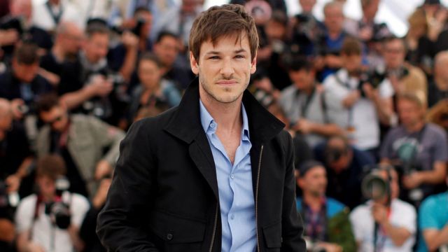 Gaspard Ulliel poses before the premiere of 