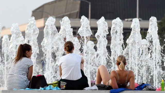 Women at a fountain in Zagreb, Croatia