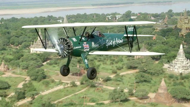 Tracey Curtis-Taylor in her bi-plane over Asia