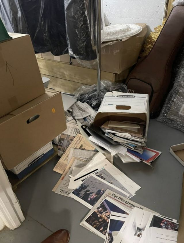 A photo of a box of spilled documents