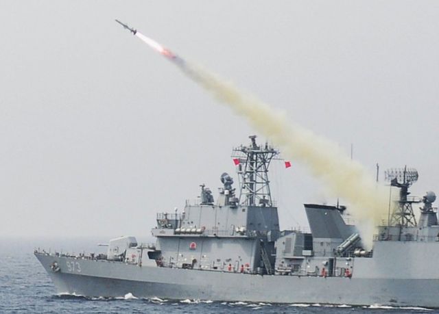 A handout photo made available by the South Korean Navy shows the 3,200-ton destroyer Yang Manchun firing a Harpoon anti-ship missile as the Navy and Air Force conduct a joint live-fire drill in the East Sea, 6 July 2017.