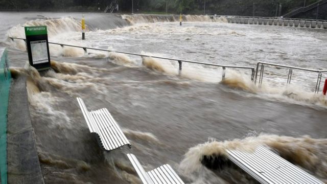 The swollen Parramatta River is seen overflowing in Sydney, Australia. Photo: 20 March 2021
