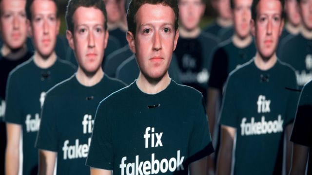 photo of Mark Zuckerberg posters from an Anti-Facebook protest