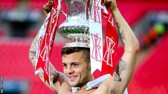 Jack Wilshere with the FA Cup trophy in 2014