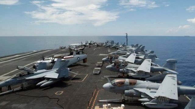 中國在有爭議的南沙群島擴大島礁後，美國海空軍加強了在南海的巡航和演習