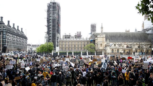 Protesters gather in Parliament Square, London