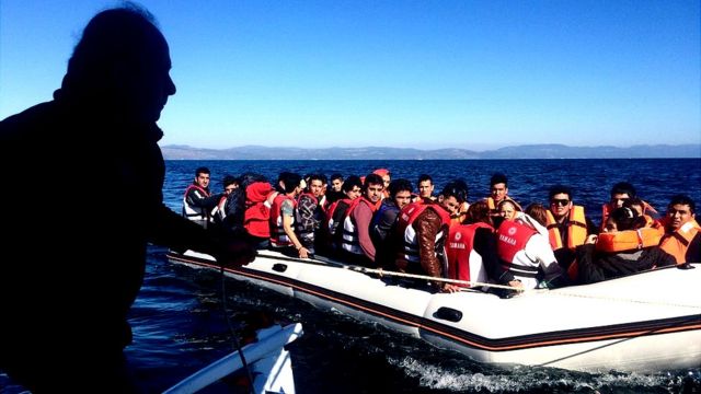 Migrantes en un barco