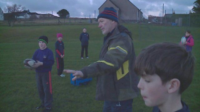 Calum Caimbeul a' teagasg chloinne