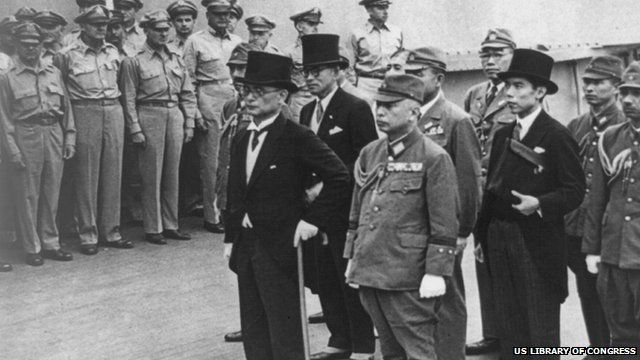 Japanese Foreign Minister Mamoru Shigemitsu (8-R) and Japanese General Yoshijiro Umezu (6-R) and the Japansese delegation aboard the USS Missouri for the signing the surrender documents on 2 September 1945