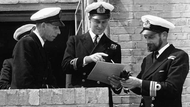 Lieutenant Philip Mountbatten talking to a group of naval officers - 1947