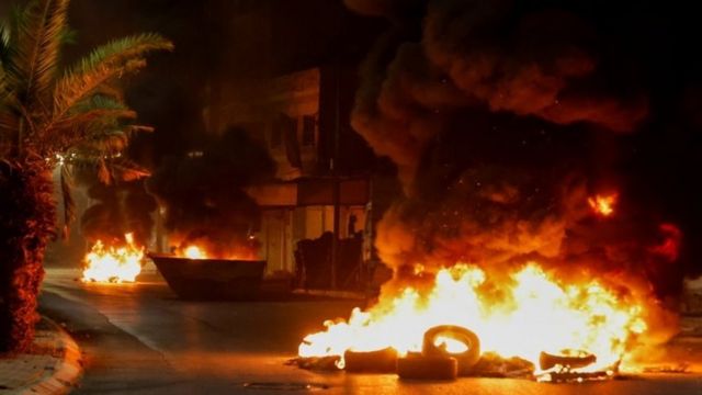 Burning tyres in Jenin after Israeli raid