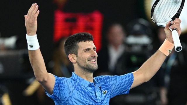 Novak Djokovic celebrates winning the Australian Open