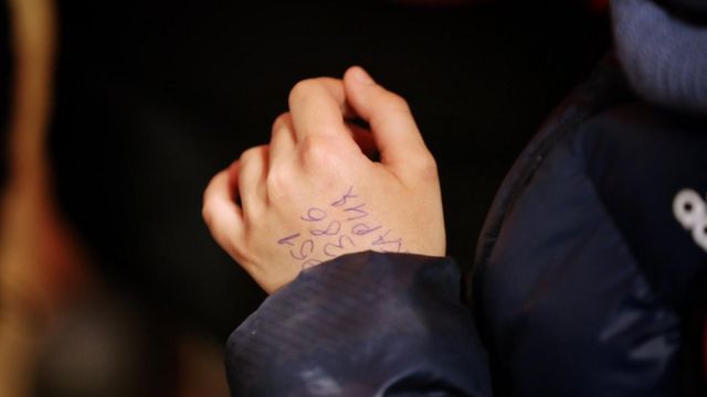 Hassan had his relative's phone number in Slovakia written on the back of his hand