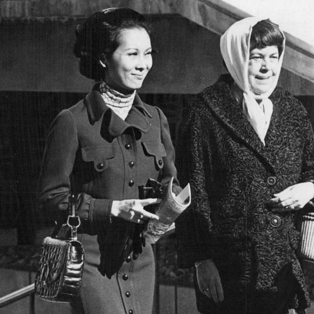 NOV 19 1970; Mrs. Nguyen Cao Ky, left, is escorted by Mrs. Albert P. Clark, wife of the air force Academy superintendent as they began a tour of the AFA Campus