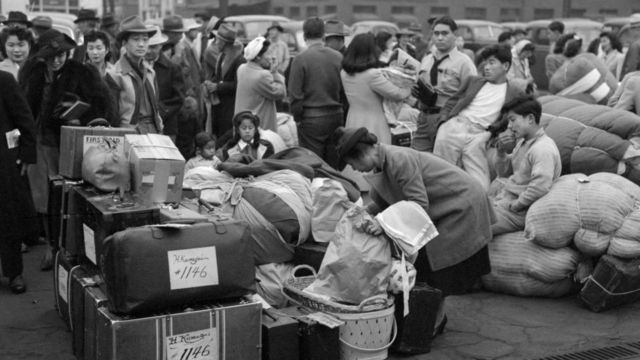 Japanese-Americans with Baggage Waiting for Train to Owens Valley During Evacuation under US Army War Emergency Order, Los Angeles