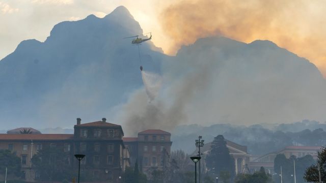 A helicopter battles a blaze that destroyed the nearly 200-year-old Jagger Library on the University of Cape Town (UCT) campus