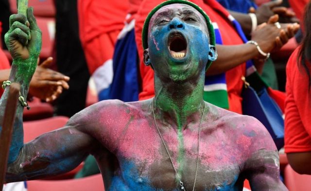 A Gambian supporter reacts during the Group F Africa Cup of Nations (CAN) 2021 football match between Mauritania and Gambia at Limbe Omnisport Stadium in Limbe on January 12, 2022