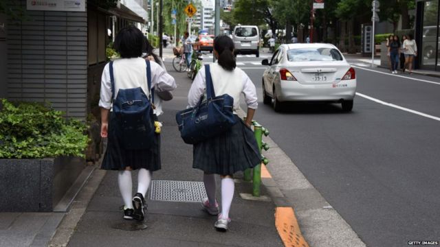 School girls walking a Tokyo street