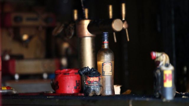 Bottles destroyed by fire in a bar in Rouen (6 August 2016)