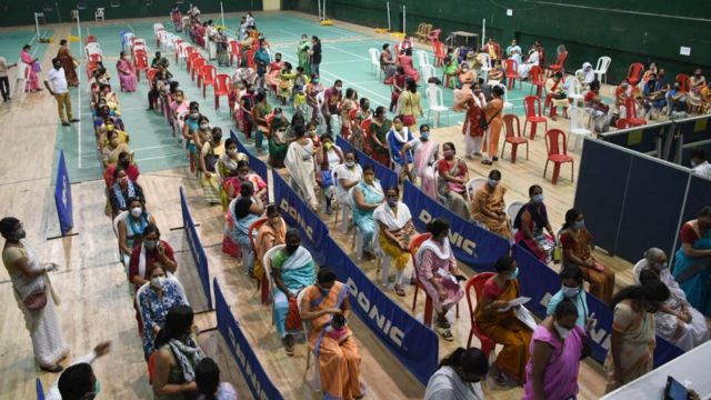 Women in queue to get vaccine against Covid-19 coronavirus in a community vaccination drive by Assam Pradesh Mahila Marcha at an indoor stadium in Guwahati, India.