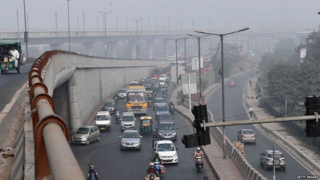 Motorist drive amid heavy smog in New Delhi on November 13, 2017.