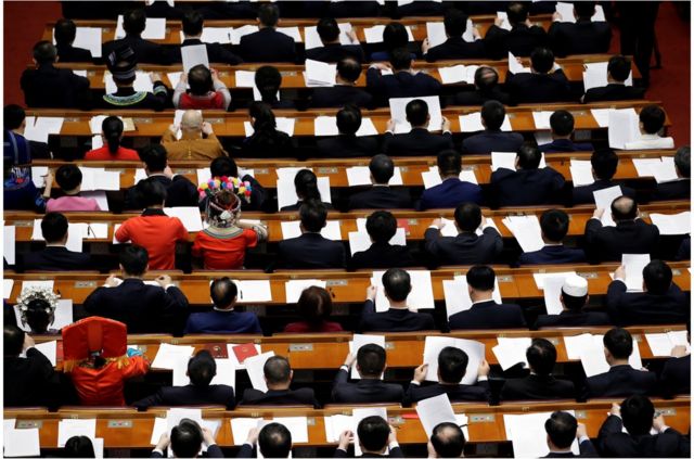 Delegates attend the fourth plenary session of the National People"s Congress (NPC) at the Great Hall of the People in Beijing, China March 13, 2018. REUTERS/Jason Lee