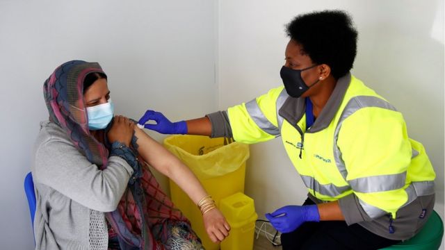 A person getting the Pfizer vaccine in Blackburn, UK