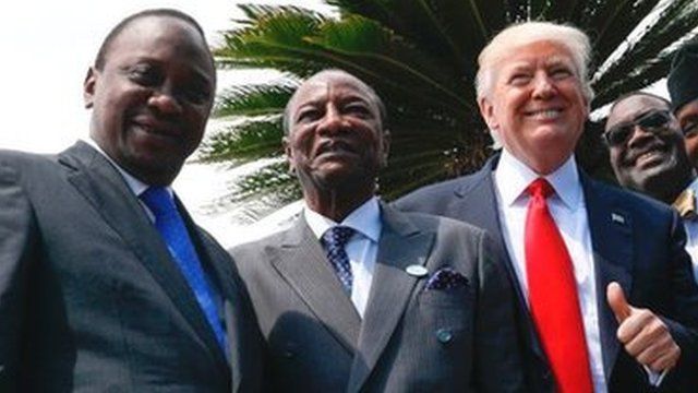 Donald Trump posing with African leaders in Italy