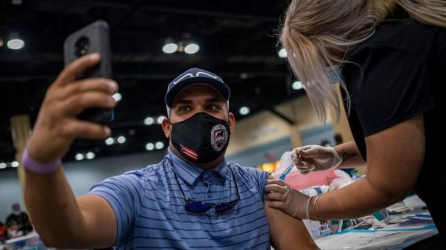 A man receives the covid-19 vaccine in Puerto Rico