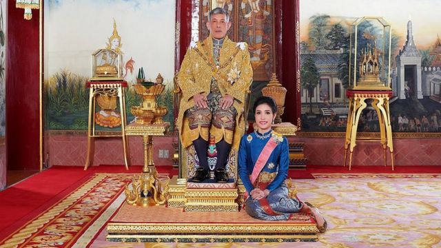 Thailand"s King Maha Vajiralongkorn and General Sineenat Wongvajirapakdi, the royal noble consort pose at the Grand Palace in Bangkok, Thailand, in this undated handout photo obtained by Reuters August 27, 2019.
