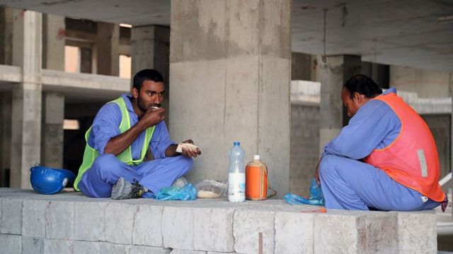 Foreign workers during a lunch break