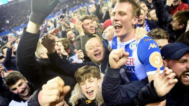 Abakunzi ba Wigan bigina intisinzi kuri City