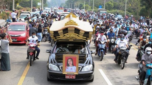 A hearse carries the body of slain Myanmar protester Mya Thwe Thwe Khaing