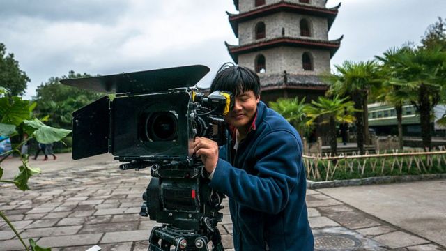 Un camarógrafo en Hengdian.