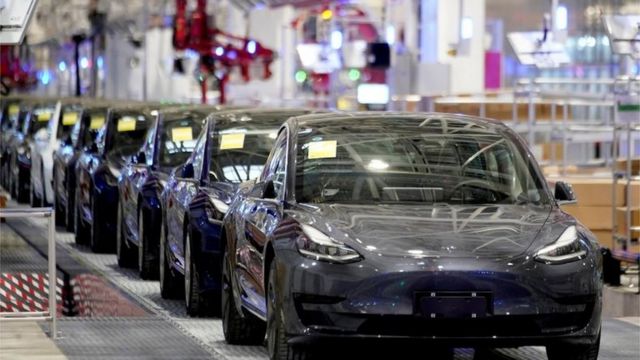 Tesla China-made Model 3 vehicles are seen during a delivery event at the carmaker"s factory in Shanghai, China January 7, 2020.