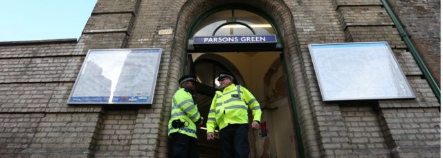 Police at Parsons Green the day after the attack